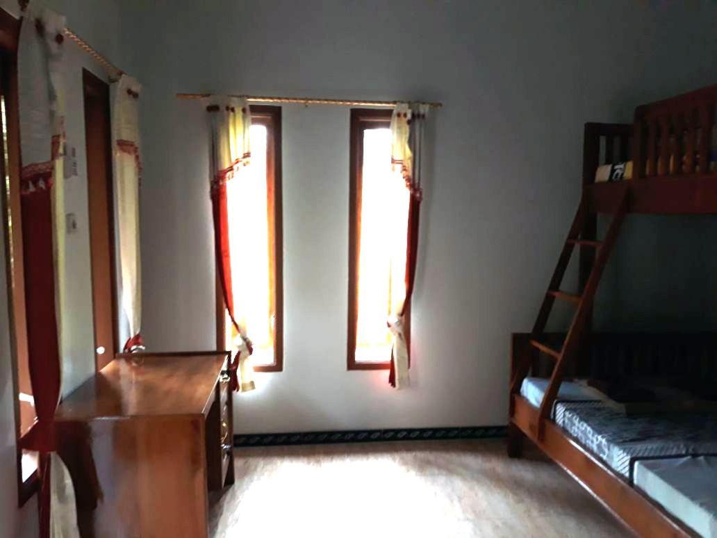Red Island Bungalows Pasanggaran Habitación foto