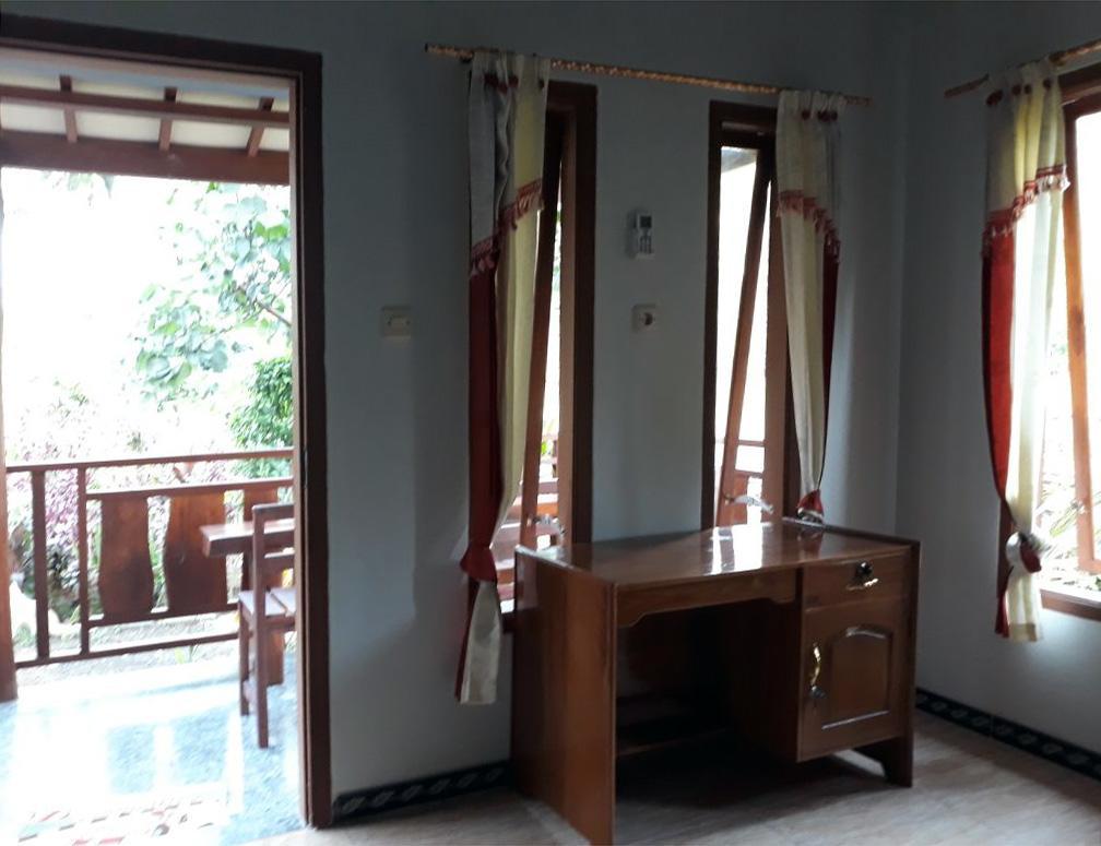 Red Island Bungalows Pasanggaran Habitación foto
